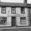 View from south east of 39 High Street, Coldstream showing W. Ford, Hairdresser, Tobacconist.