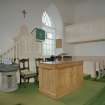 Interior. View of communion table and pulpit from gallery