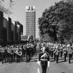 General view showing Hyde Park Cavalry Barracks with regiment band in foreground.
