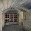 Interior. Wine cellar under E corner of SE Range