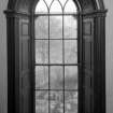 Interior.
Detail of arched window between first and second floors.