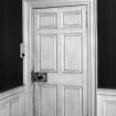 Interior.
Detail of doorway and architrave in SW apartment on first floor.