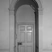 Interior.
Detail of arched entrance doorway in central apartment on first floor.