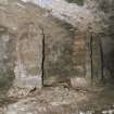 Scanned image of Interior.  Detail of stone pillars and stub wall.