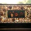 Ground floor, dining-room, detail of stained glass in bay window.