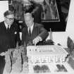 Sir Basil Spence with a model of the Chancery building.