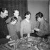 Members of Basil Spence and Partners studying the Southampton University master plan model in the lower drawing office at one Canonbury Place.  Left to right Hugh Pope, Anne Spencer-Wilkinson, John Peverley, Jack Bonnington, Brian Nicholls and Gillian Blee (nee Spence).