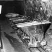 Scanned copy of view of waggons descending by rope haulage underground. The wagons are filled with high quality silica sand.