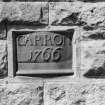 Fragment of cast-iron steam cylinder (att. James Watt) preserved on E wall of office-block