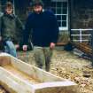 'Loch Doon' logboat experimental reconstruction (at Scottish Fisheries Museum, Anstruther): spring 1992. Reconstruction in progress: Damian Goodburn supervises.
