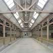 Interior view of cattle court showing view of central bay from south, Easter Suddie Farm Steading