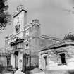 View of Porta Pia, stable block and construction site.