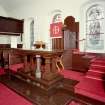 Interior. View of platform with communion table and pulpit designed by Rev H Mathers 1923