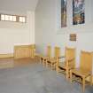 Interior. View of platform with communion table, elders chairs and font