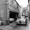 View of mews prior to conversion.