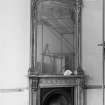 Detail of mirror and fireplace.