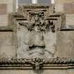 Detail of coat of arms above main entrance on south front.