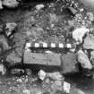 Digital copy of excavation photograph: bricks possibly from trench M17 in Area III (manor) viewed from W (see also DC 50315-16).