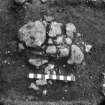 Digital copy of excavation photograph: unidentified stones.