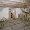 Interior. Ground floor. Storage room (N central room). View from W (towards kiln area).