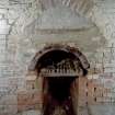 Interior. Ground floor. Kiln room. Kiln firebox. Detail showing repaired area dated '1942'.