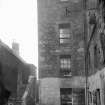 General view of Thomson's Court prior to alterations in 1916-17 from North.  Also visible is part of rear elevation of the Abbey Tavern.