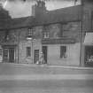 Old houses on the East side of Lauriston Street, including No.s 69 and 71 (now demolished).