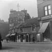 View of old houses and shops on Lauriston Street and Lauriston Place, Edinburgh, since demolished.