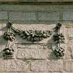 South facade, detail of swag decoration over former entrance