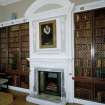 Ground floor, library, interior view of fireplace and overmantle at north end