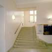 Interior. Ground floor, staircase hall, view of stair from N