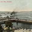 Dunoon, The pier.
View from West.
Postcard titled: 'Esplanade and Pier, Dunoon'