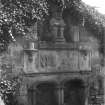 'Provost'  above 17th Century fireplace in churchyard wall. Photographe taken prior to June 1939 when it was relocated to present site in Ceres.
