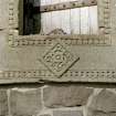 Detail of decorative carving on cill of doorway