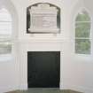Interior. 1st floor, detail of fireplace with war memorial above