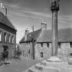 Digital copy of view of Miss Gourlay's House, McLeans property and Mercat Cross from SW.