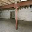 Interior. Second floor, E end from NW. Detail of cast-iron column
