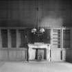 Edinburgh, Niddrie Marischal House, interior.
View of library fireplace and shelves.