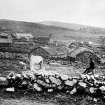 Kilmory, Chapel.
View of the village showing the position of the ancient chapel. Copy of historic photograph, inscribed 'Village and ruins of chapel at Kilmory, Point of Knap'.