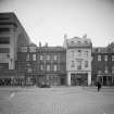 View from south of 137 - 144 Princes Street showing pedestrians, cars and traffic warden.