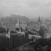 View of Princes Street, Edinburgh to SW from Calton Hill with Calton Jail in foreground. 
Titled: 'Edinburgh from Calton Hill, J.Patrick'.