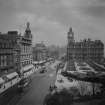 View from Scott Monument looking east towards Calton Hill showing the North British Hotel, Waverley Gardens and a busy Princes Street with shop awnings, pedestrians, trams and horse drawn vehicles.