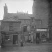 View of shop fronts at 64 and 66 Morrison Street, Edinburgh, including Anderson Green Grocer. Since demolished.