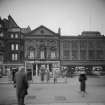 View of the Royal British Hotel, The Palace Cinema  and Woolworths (since demolished) on Princes Street, Edinburgh showing pedestrians and cars.