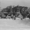 View from South East of 13, 14, 15 Swanston Village and Old School House in the snow.
