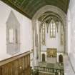 Interior. Chapel. View from gallery towards chancel including oriel window