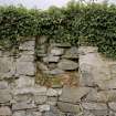 Interior, detail of blocked window in W wall of N aisle