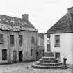 Culross
View from the north of The Ark with the market cross in the foreground (before restoration). Scanned image from original glass plate negative. Original envelope annotated by Erskine Beveridge 'Cross Culross'