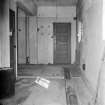Scanned image of negative showig Interior view of room with drain trench in RN Research Establishment.