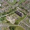 Scanned image of oblique aerial view of the Ardler Estate centred on a tower block, taken from the SW.